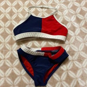 Kids Tommy Hilfiger swimsuit top and bottoms.